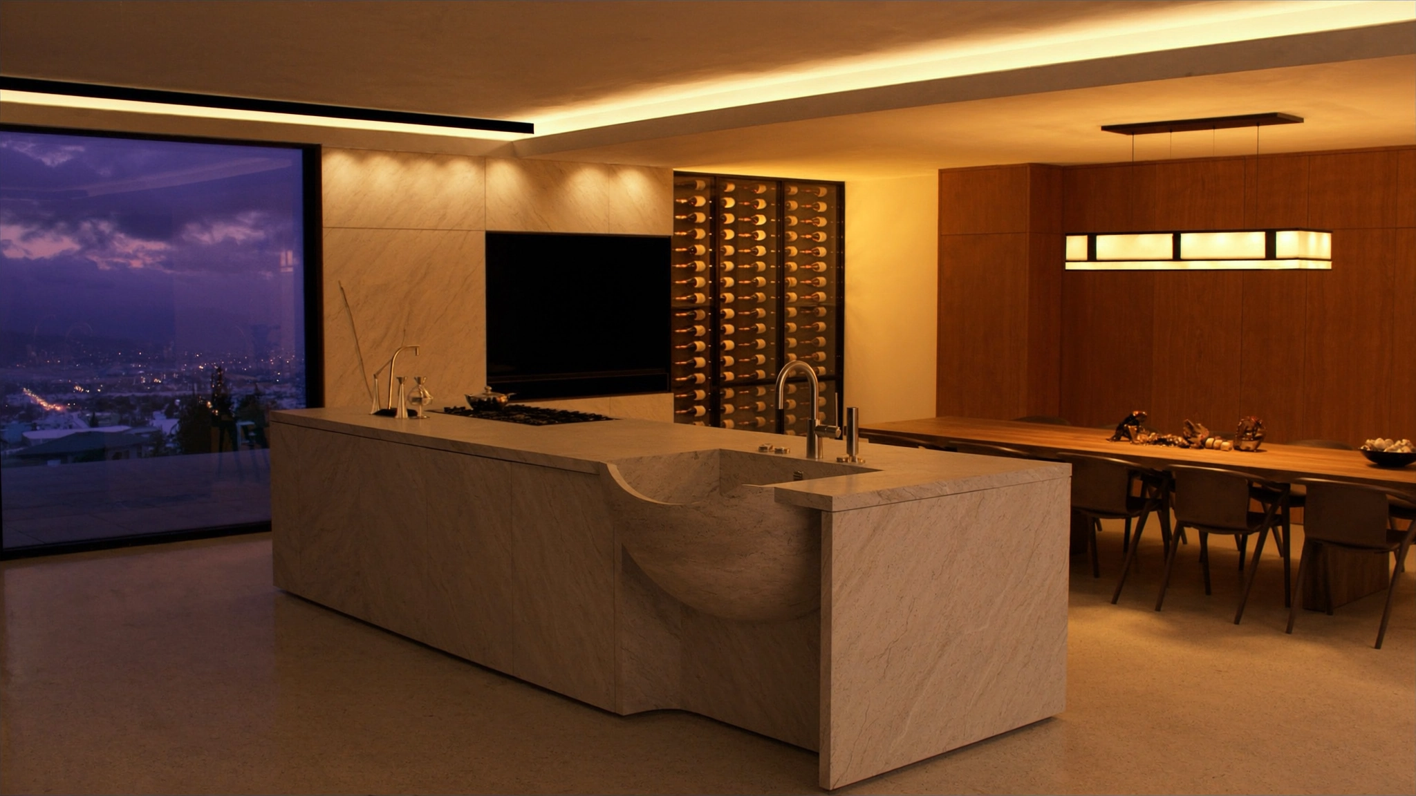 Cocina y comedor de una vivienda de autor al anochecer