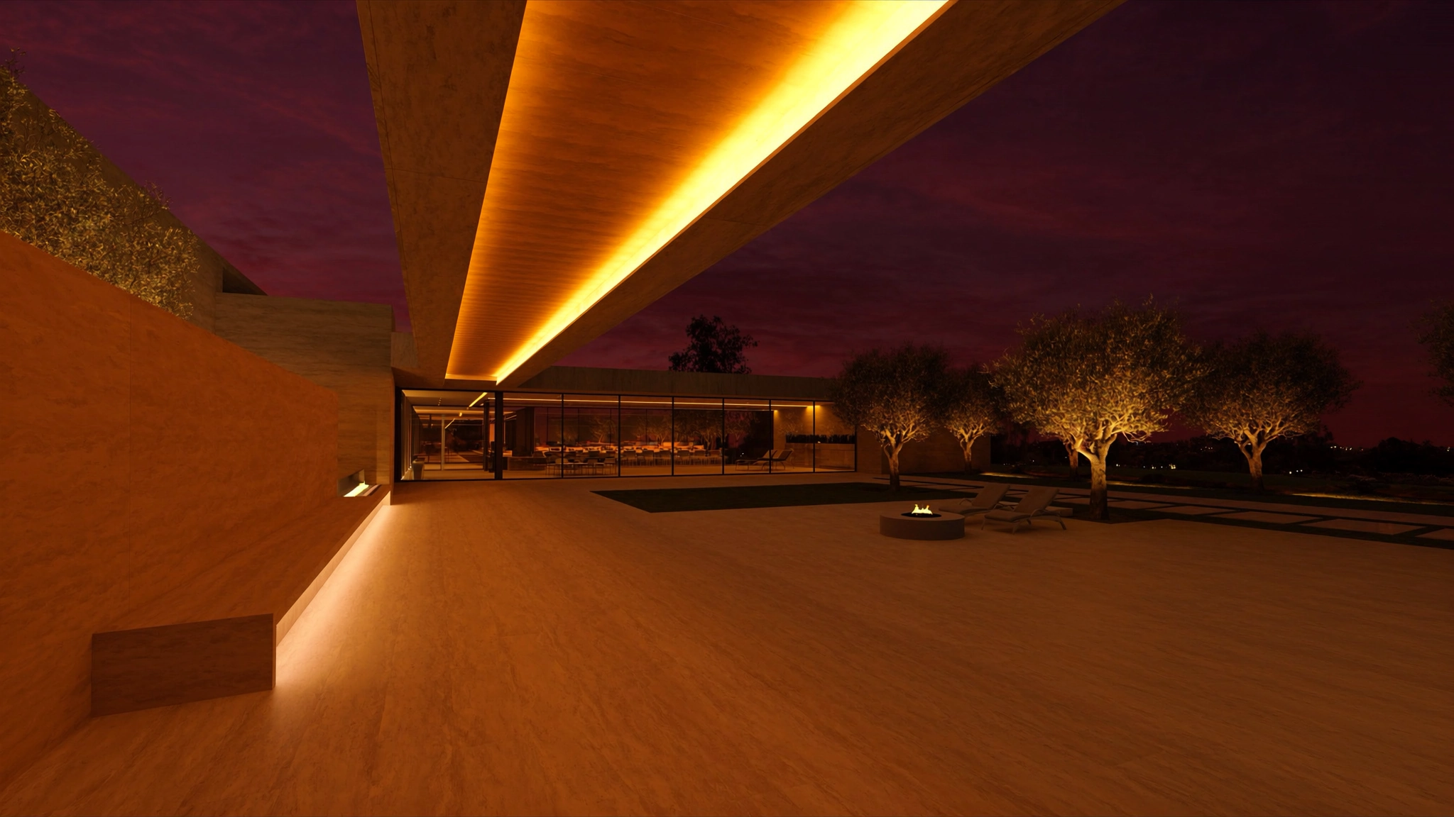 Terraza cubierta de una vivienda de autor al anochecer